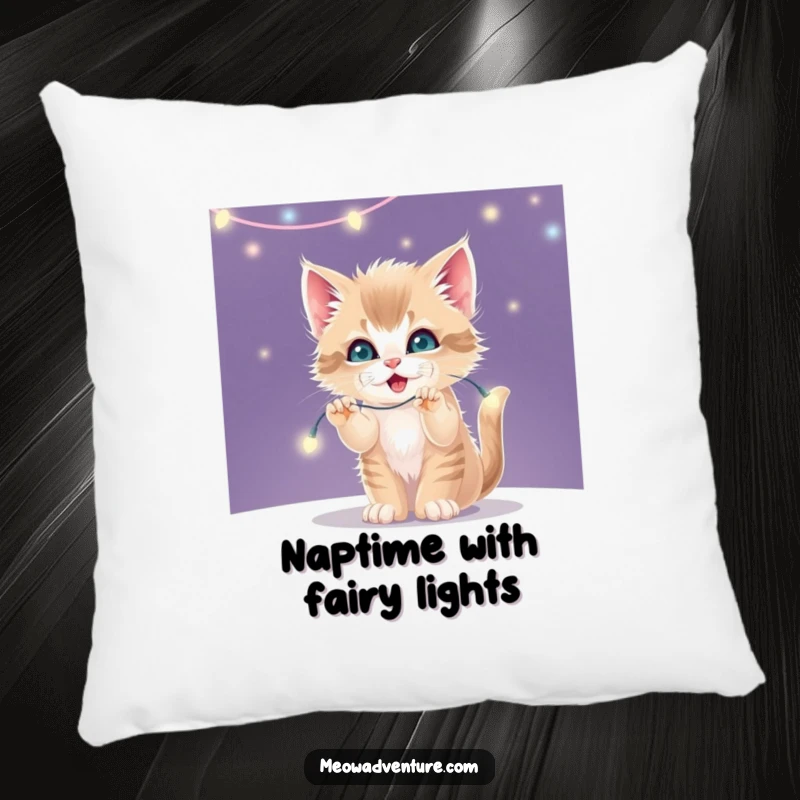 Funny decorative pillow with a mischievous kitten batting playfully at a string of sparkling, twinkling fairy lights.