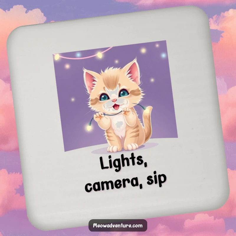 Funny set of drink coasters featuring a mischievous kitten batting playfully at a string of twinkling fairy lights.