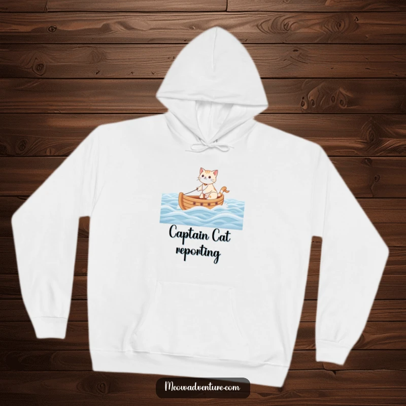 Funny hooded sweatshirt showing a brave cat sailing a toy boat bravely across a simulated carpet ocean, ready for anything.