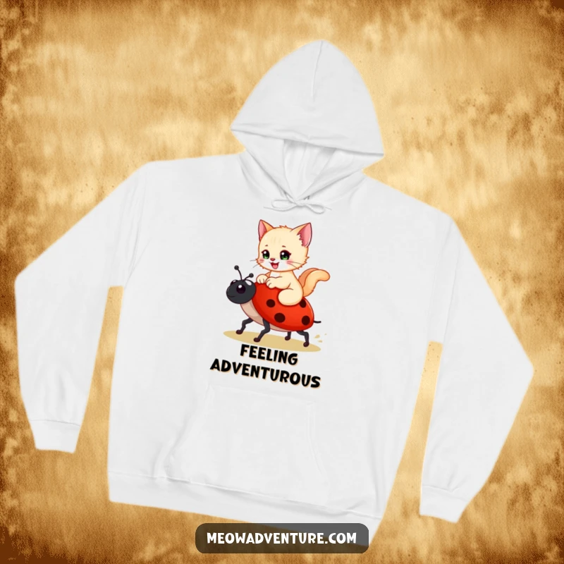 Funny hoodie featuring a happy kitten riding a ladybug like a steed, designed for ultimate comfort and whimsical delight.
