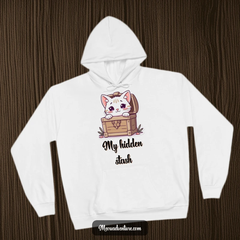 Funny Cat Hoodie: A curious cat peeks from a treasure chest, offering cozy warmth and a humorous, mysterious design.