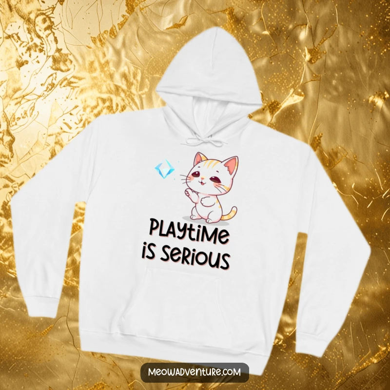 Funny Cat Hoodie: A playful cat bats at a sparkling gem, offering cozy comfort and a whimsical, humorous design.