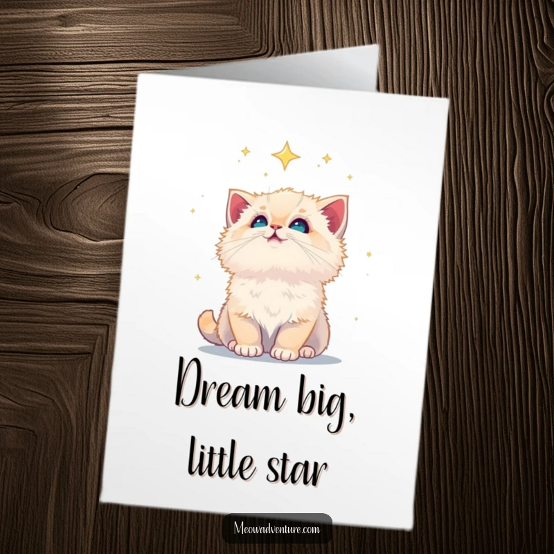 Free Printable Birthday Card: A fluffy kitten looking up in wonder at a vast, starry night sky, dreaming of birthday magic.