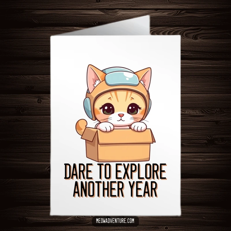 Funny Free Printable Birthday Card: Cat in tiny helmet bravely peeking into a mysterious, unopened box.