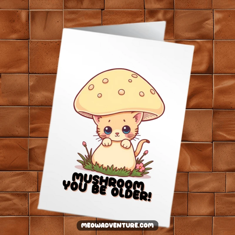 Funny Free Printable Birthday Card: Curious kitten peeking charmingly from behind a giant, whimsical mushroom, ready to deliver birthday wishes.