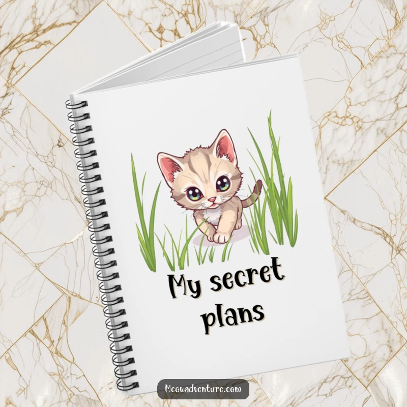 Funny notebook with a cover showing a stealthy kitten tiptoeing through tall grass, inspiring secret notes.