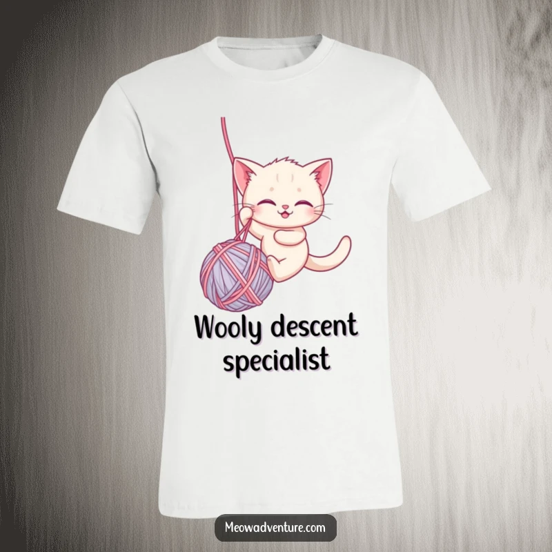 Funny t-shirt featuring a brave kitten rappelling down a large ball of yarn, symbolizing courage and playful, adventurous spirit.