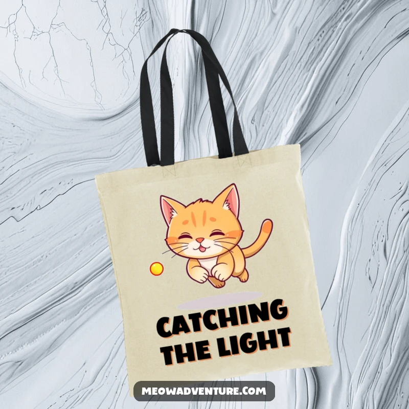 Funny Laser Cat Tote Bag featuring a ginger cat enthusiastically chasing a red laser dot, perfect for carrying essentials.