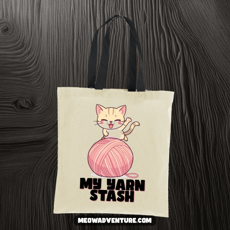 Funny Cat Tote Bag: A determined cat leaps over a giant ball of yarn, perfect for carrying groceries with a side of humor.